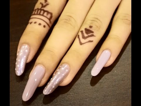 لايف ستايل"مناكير" بنفسجي فاتح مع لمعة وتصميم بسيط44954/0