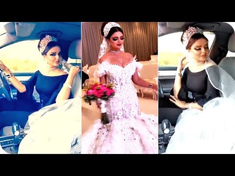 لايف ستايلشاهد: عارضة أزياء تسوّق سيارتها بفستان الزفاف59278/0