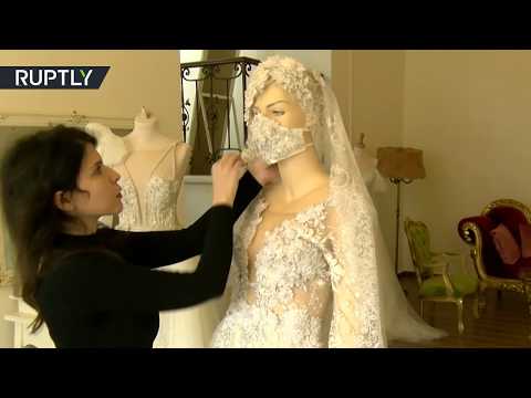 لايف ستايلشاهد: "خياطة كمامات" تُناسب فساتين الزفاف وتقي العروس من عدوى "كورونا"173207/0