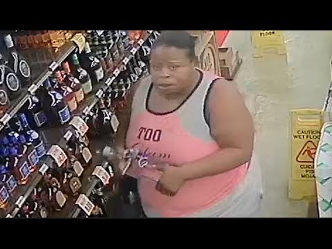 شاهد لحظة سرقة امرأة للعشرات من زجاجات الكحول