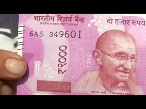 شاهد طوابير في الهند أمام المصارف لتبديل عملات ورقية
