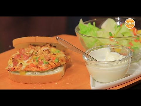 شاهد إعداد سندوتش دجاج بانيه بالهوت دوج والجبنة
